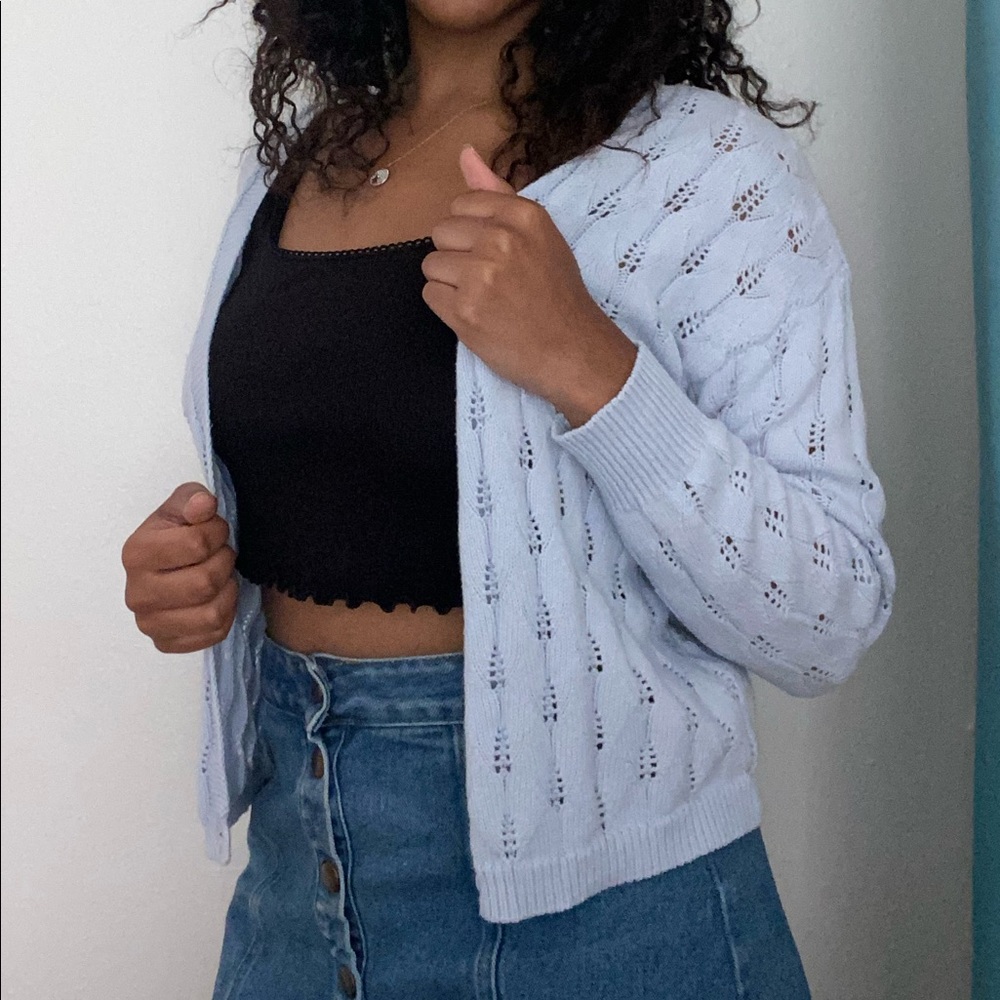 Light blue cotton cardigan.